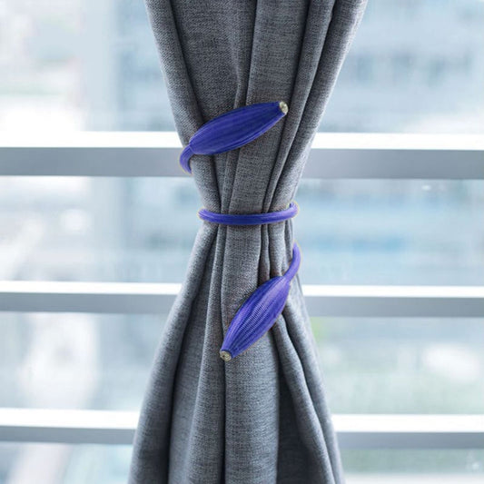 Blue curtain tie rope fastening a gray curtain, with two leaf-shaped ends