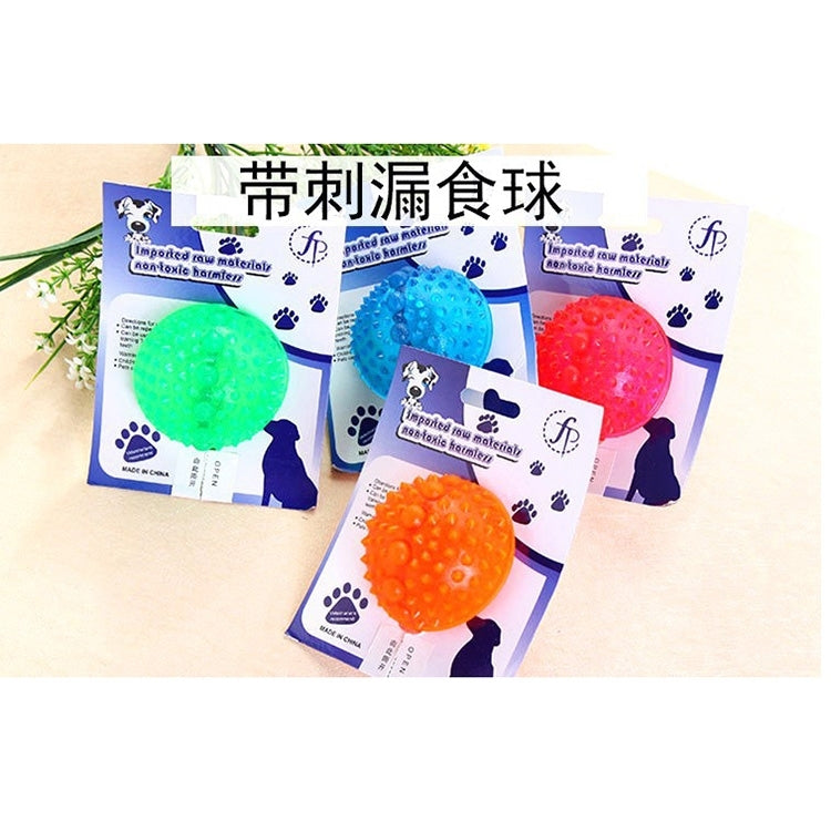 Boxed assortment of spiked treat-dispensing puppy bite balls in green, blue, and red