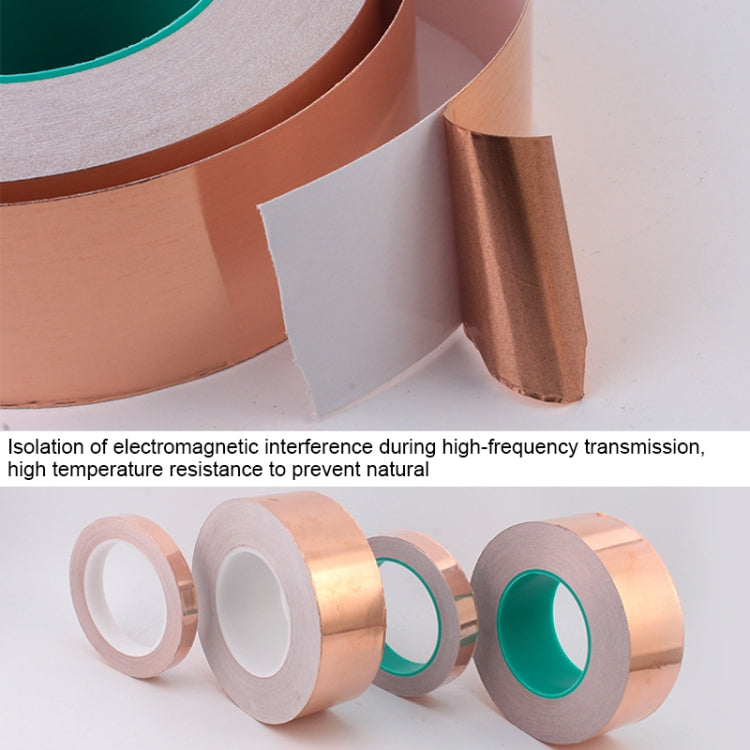 Close-up of copper foil conductive tape rolls with green center liner and backing sheets