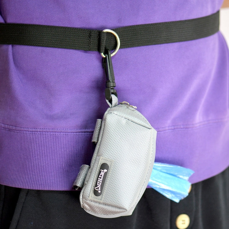 Light gray pet snack and waste pouch attached to belt with blue waste bag