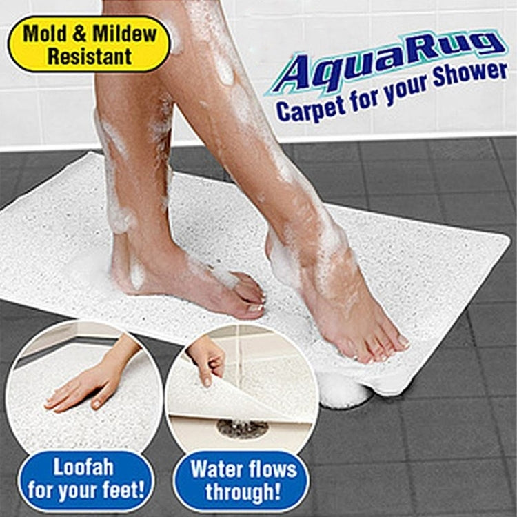 Rectangular white speckled bath mat with loofah-like texture for drainage and non-slip grip