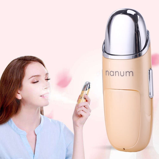 Peach and chrome mini facial misting massager with nanum logo, handheld sprayer