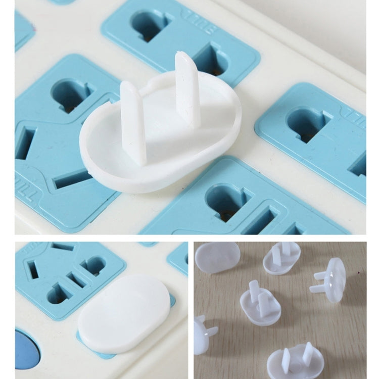 2-hole baby outlet safety plug covers, white plastic, multiple covers shown