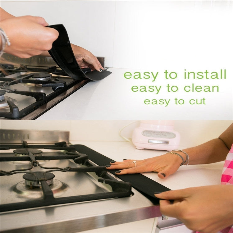 Black gas stove sealing strip installed along countertop edge