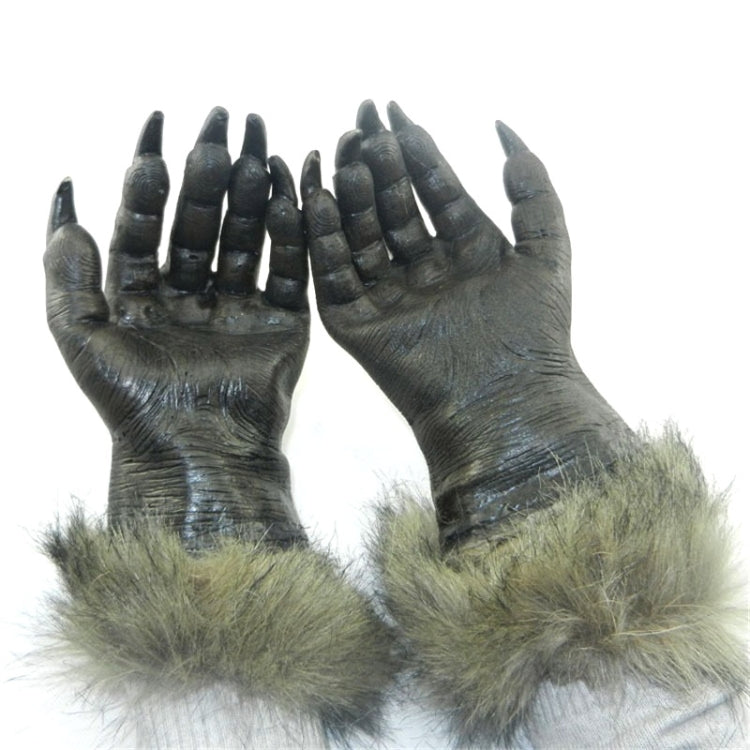Two gray latex wolf gloves with green faux-fur cuffs and raised finger shapes