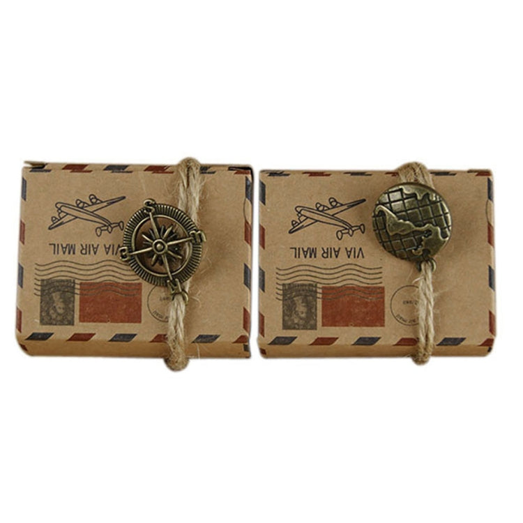 Compass-shaped kraft sugar box with retro mail print, twine ties and globe/compass panels
