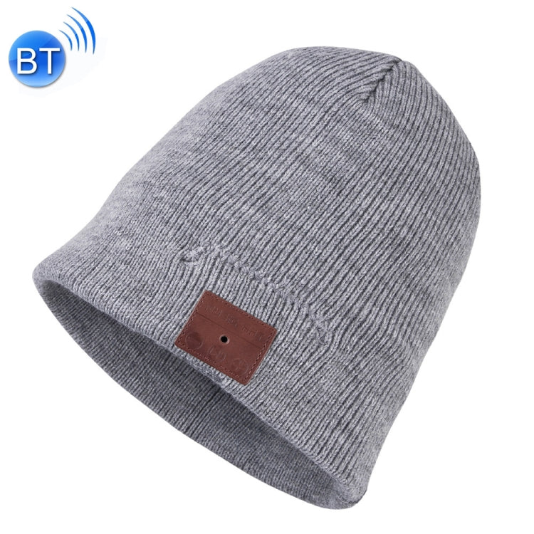 Light gray knit beanie with brown control patch on front