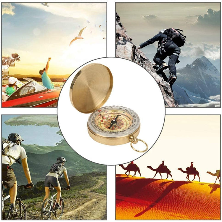 Brass pocket compass with round cover, compass face, and attached key ring