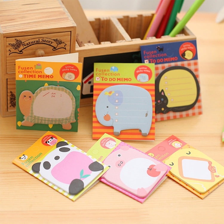 Assorted cartoon animal sticky notes pads displayed with desk stationery items