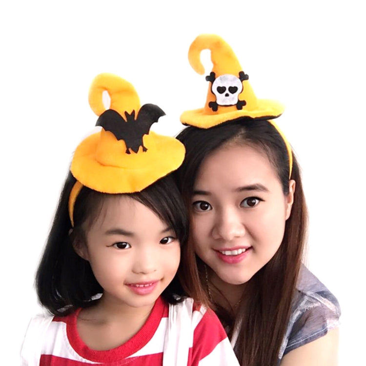 Children wearing yellow plush Halloween character headbands with pumpkin and panda-skull hats