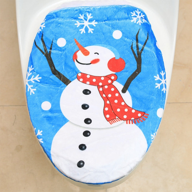 Snowman toilet lid cover with red scarf, branch arms, and snowflake pattern