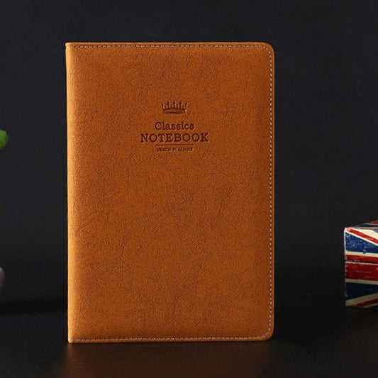 Brown leather soft cover notebook with embossed "Classic Notebook" logo on front.