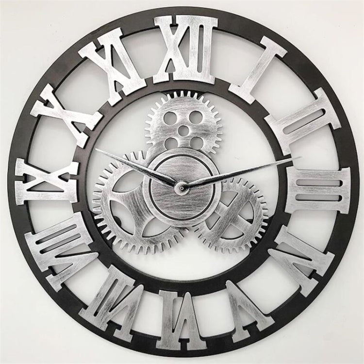Round gear wall clock with Roman numerals, silver face and dark outer ring.