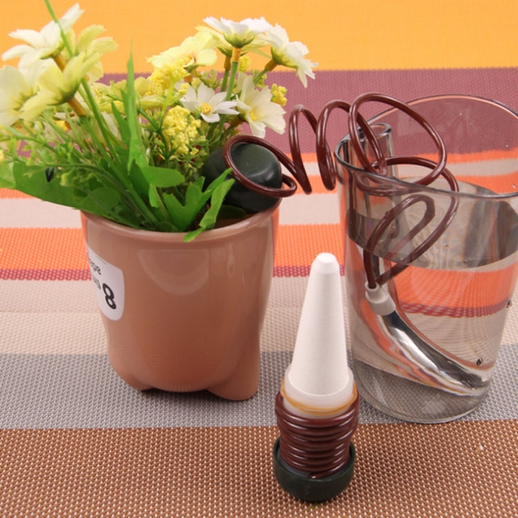 2-piece automatic drip watering device set with coiled spring nozzle, tubing, and adapter