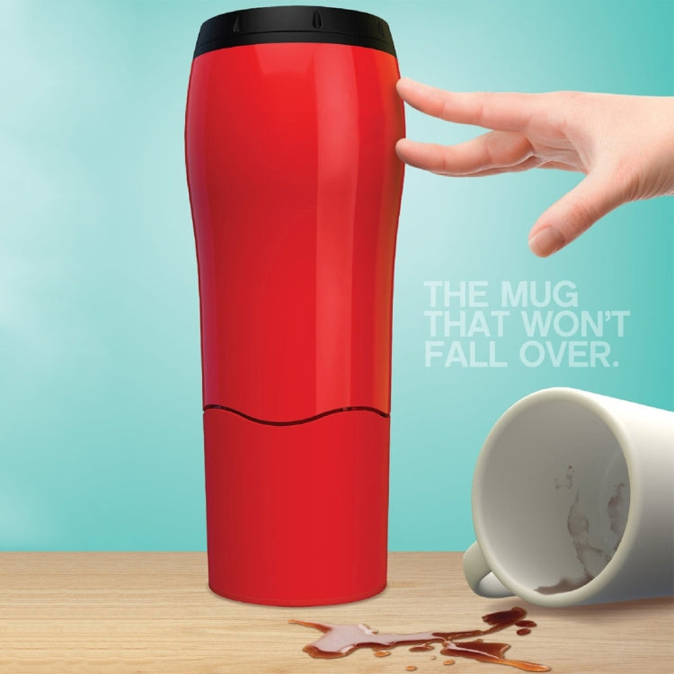 Red insulated travel mug with black lid, hand holding near top