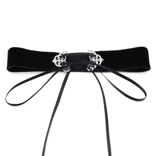 Black velvet choker with silver scroll clasp and multiple dangling ribbon straps