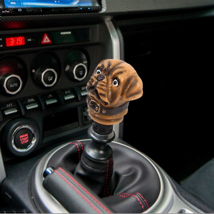 Bulldog-shaped gear shift knob cover mounted on car shifter