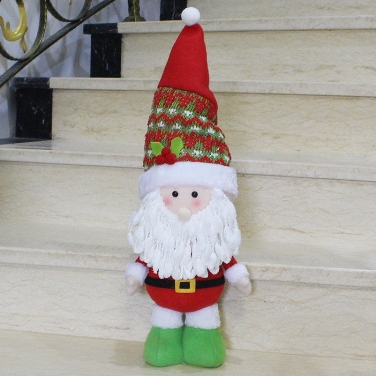 Standing Santa holiday decoration doll with red hat, green pants, and fluffy white beard