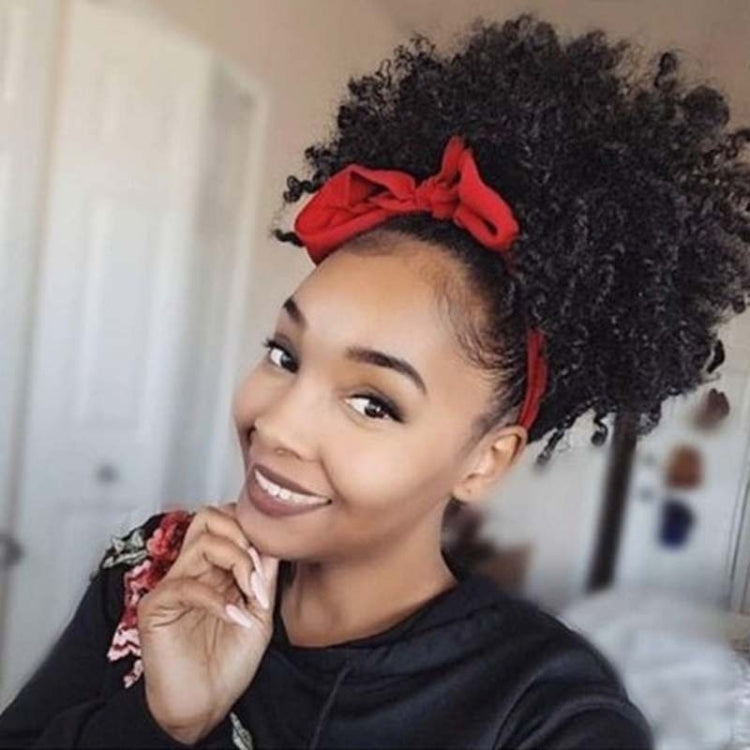 Black curly hair wig with high puff, red bow headband detail