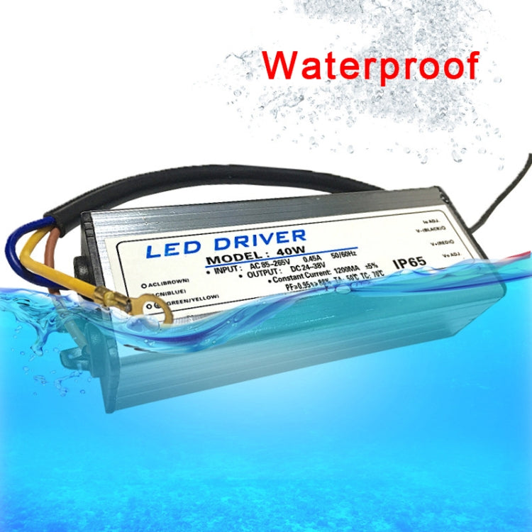 Submerged LED driver adapter with connected leads in water