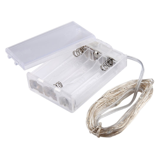 Clear battery pack with coiled silver LED wire and two battery springs