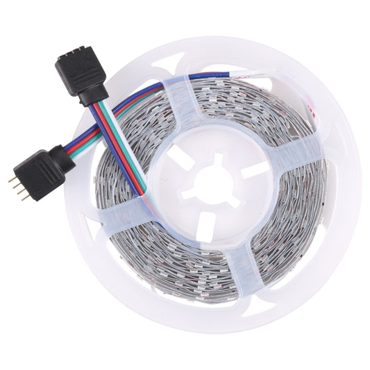 RGB LED rope light reel with silver LED strip inside clear housing and black plug