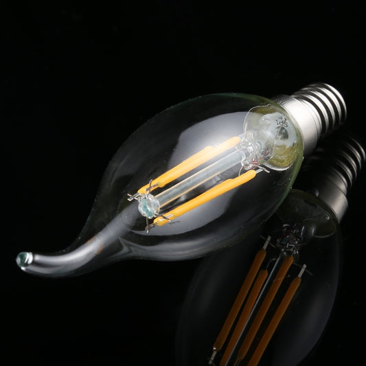 Retro LED filament bulb with clear glass, glowing filaments, and E14 long-tail base