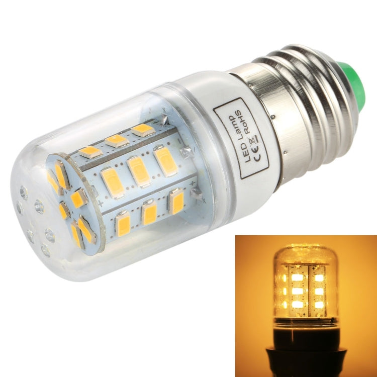 E27 LED corn light bulb with clear dome and glowing warm light, silver base, SMD LEDs