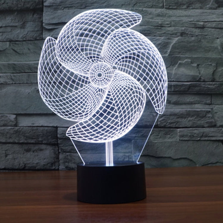 White pinwheel wire desk lamp with fan-style LED glow and round black base