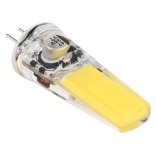 G4 warm white LED corn light bulb angled view, clear housing and dual prong pins