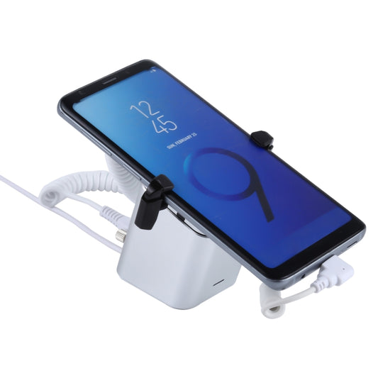 Square anti-theft phone stand with tablet-style base and USB-C cable, holds a phone