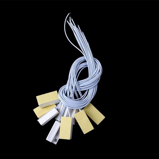 Magnetic door sensor switch kit with bundled light-blue wires and multiple contact bases