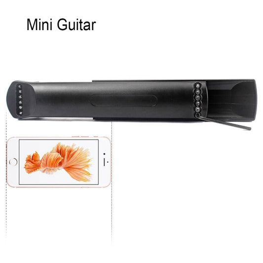 Black mini pocket guitar practice tool with 6-fret neck and string head