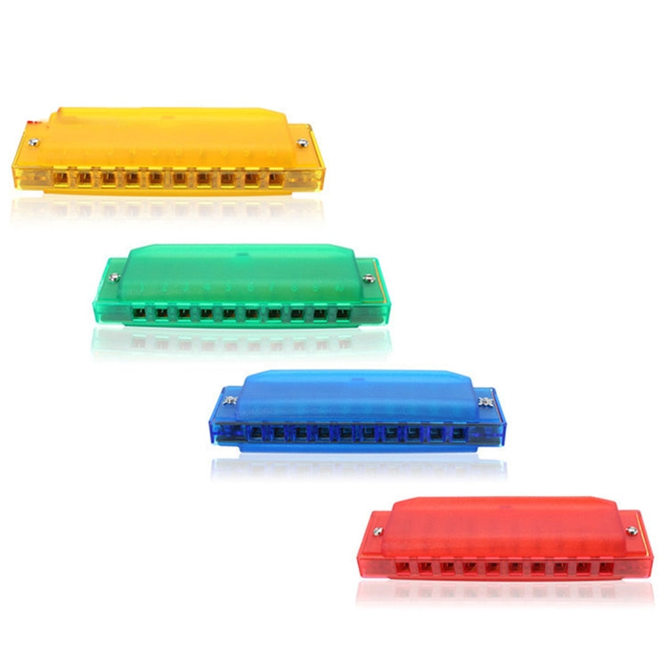 Assorted transparent harmonicas in red, blue, green, and yellow with tone holes