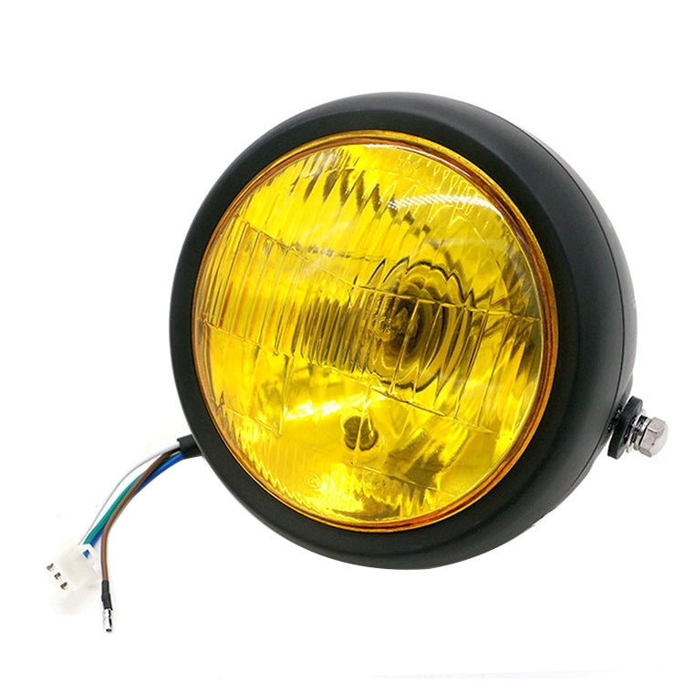 Black retro motorcycle LED headlight with yellow lens and round housing