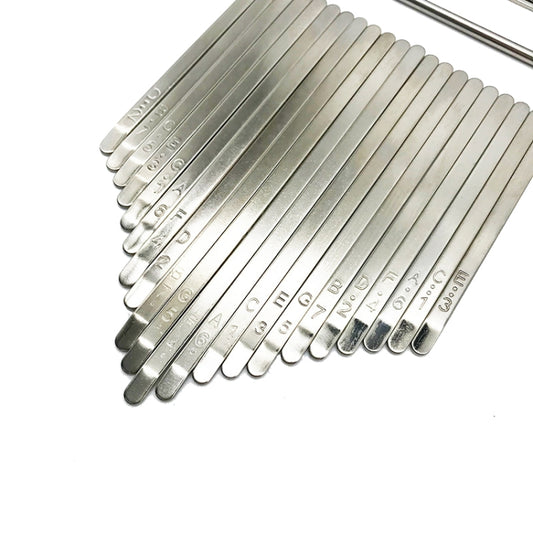 Metal kalimba key strip set with engraved note numbers and 21 keys