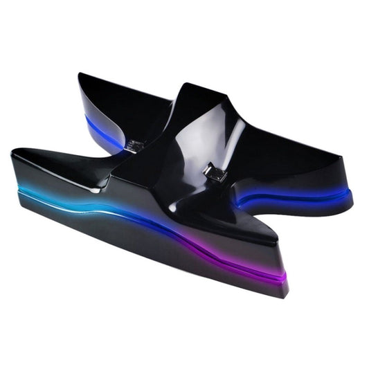 Black UFO-shaped controller charging dock with purple and blue multicolor LED lighting