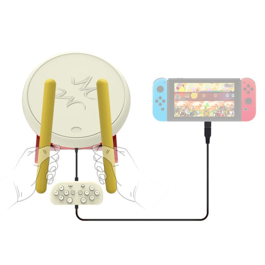 Taiko drum controller kit with cream drum, yellow sticks, and TV hookup for Nintendo Switch