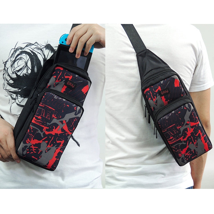 Black crossbody storage bag with red graphic print worn diagonally across the body