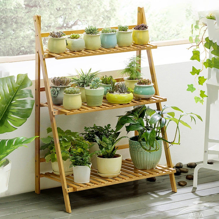 Bamboo 3-tier plant stand with three shelves holding multiple potted plants