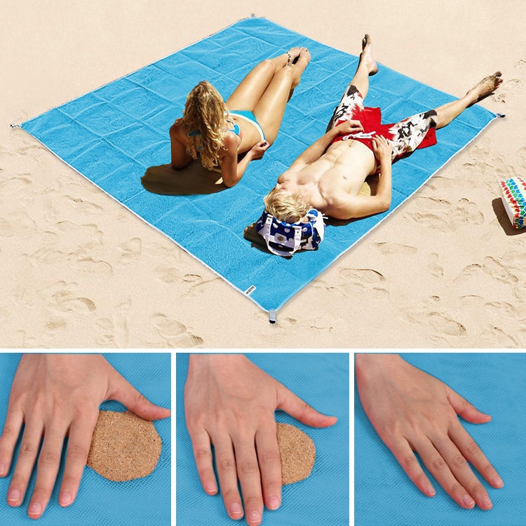 Blue foldable sand-free outdoor picnic mattress with grid top and folded corner