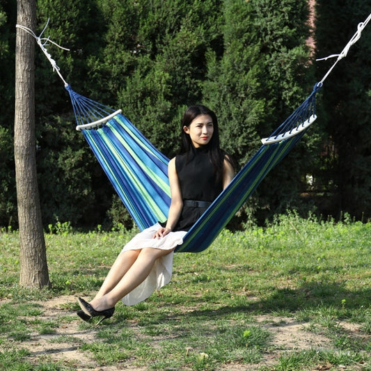 Blue striped double hammock swing with wooden spreaders for two people