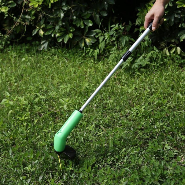 Handheld cordless weed trimmer with green base, silver pole, black head and yellow line