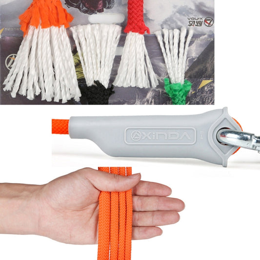 Orange auxiliary rope with gray clamp body, held in a hand for outdoor safety
