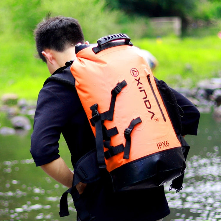 Waterproof 30L shoulder mountaineering bag, orange with black panels and straps