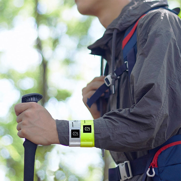 Reflective wristband on arm sleeve, neon yellow band with silver reflective strip