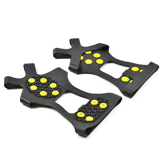 Black ice shoe traction covers with yellow stud grips, three covers laid out