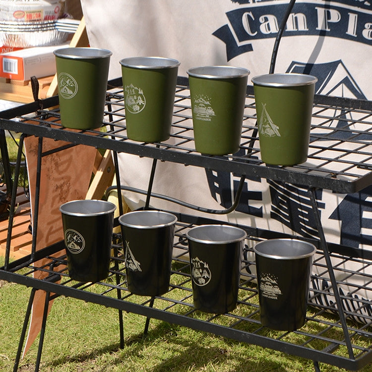 Green folding stainless steel water cup set shown on an outdoor rack