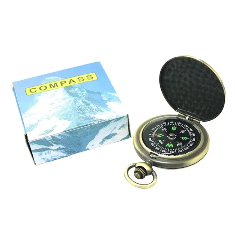 Vintage pocket compass watch with retail box, open black dial cover, gold-tone metal