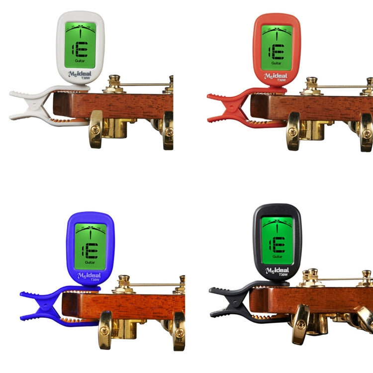 Four clip-on tuners showing black, blue, red, and white colors on guitar headstocks